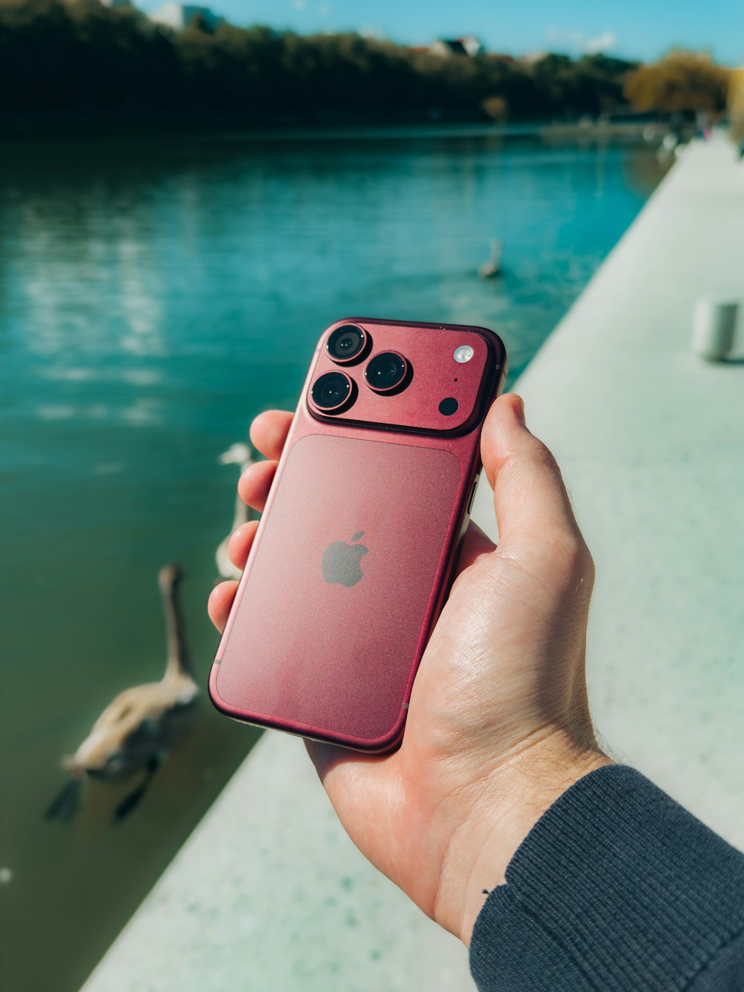 iPhone 18 Pro and Pro Max Launched: Price, Features, Camera, Battery Life & More 2 Burgundy iPhone 18 Pro held outdoors